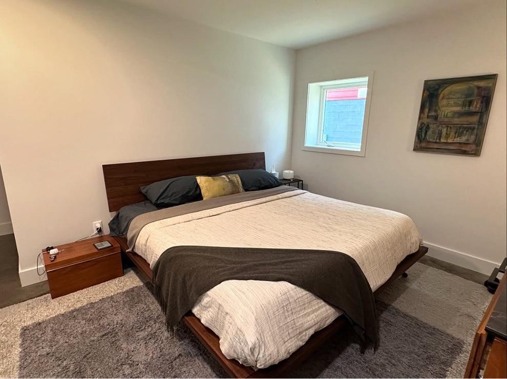 custom hardwood bed in bedroom