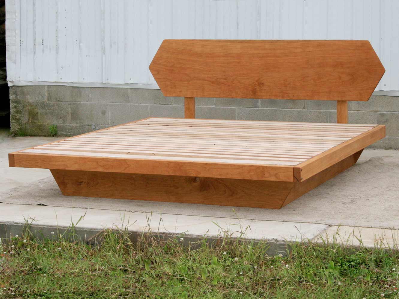Low Platform Bed with headboard and angled base frame angled view