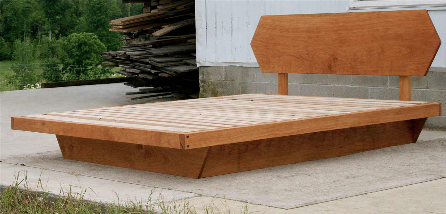 Low Platform Bed with headboard and angled base frame side view