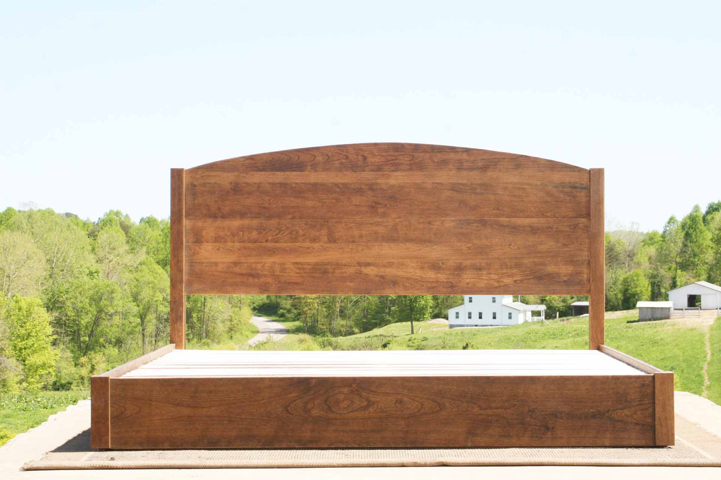 Low Platform Bed with arched headboard front view