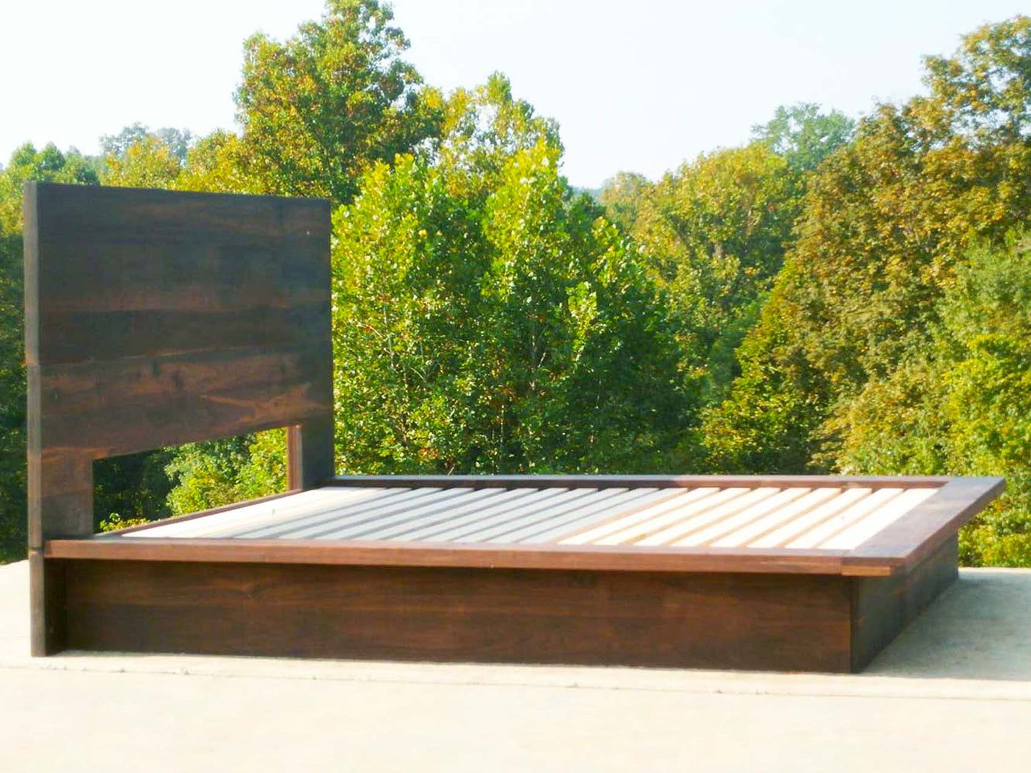 modern platform bed with wide side extensions side zoomed in view