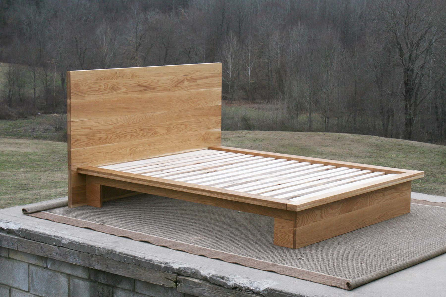 low profile platform bed light hued side view