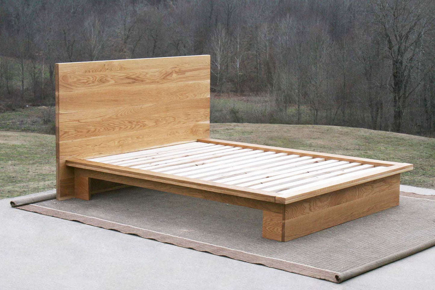 low profile platform bed light hued side view