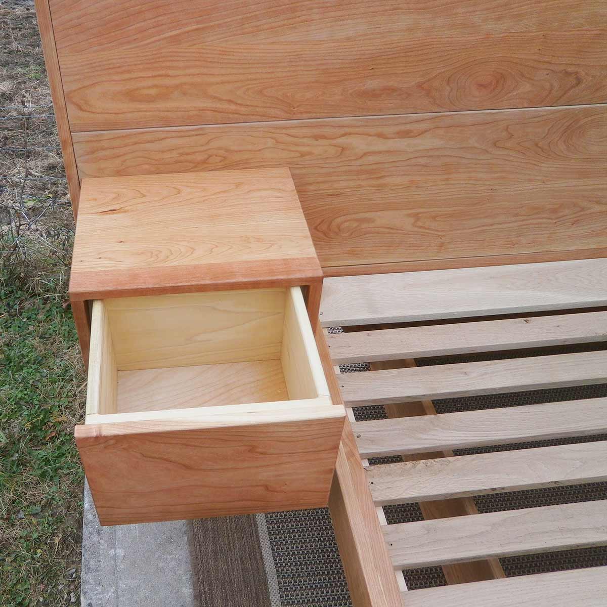 attached table of low platform bed with wide headboard attached tables and angled base frame