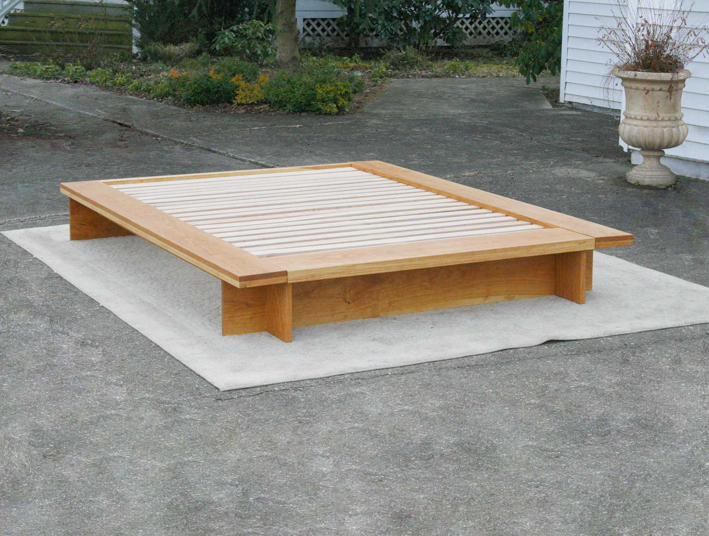 Low Platform Bed with wide platform and optional side tables front view