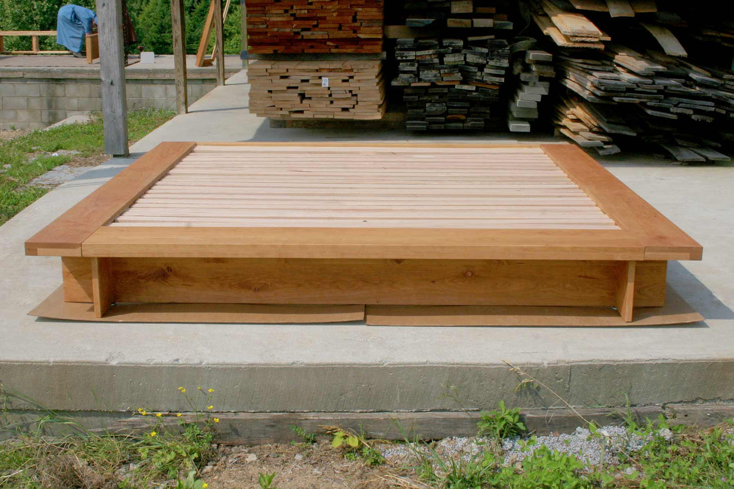 low platform bed with wide platform and optional side tables front view