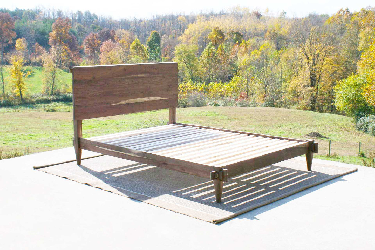 Raised platform bed with a mortise and tenon system side view