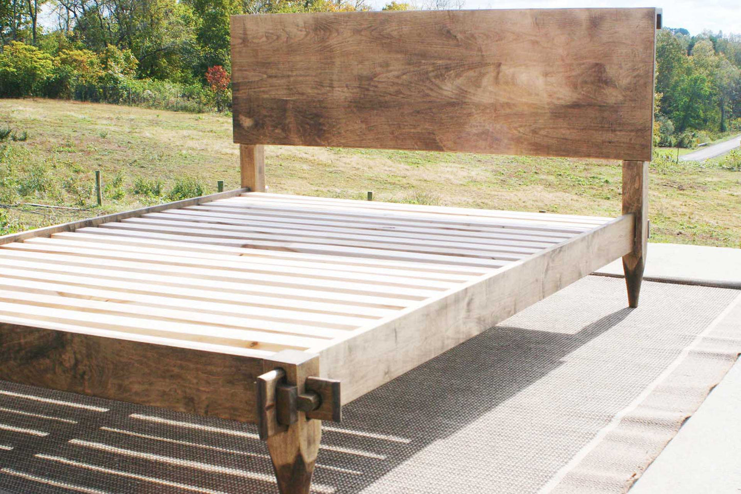 close up Raised platform bed with a mortise and tenon system