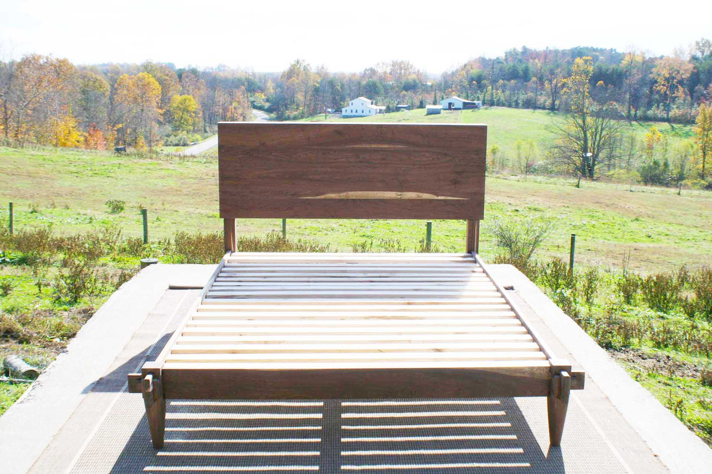Raised platform bed with a mortise and tenon system front view