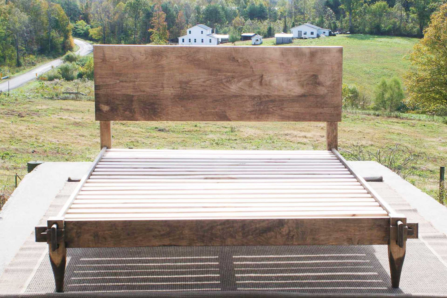 Raised platform bed with a mortise and tenon system close up front view