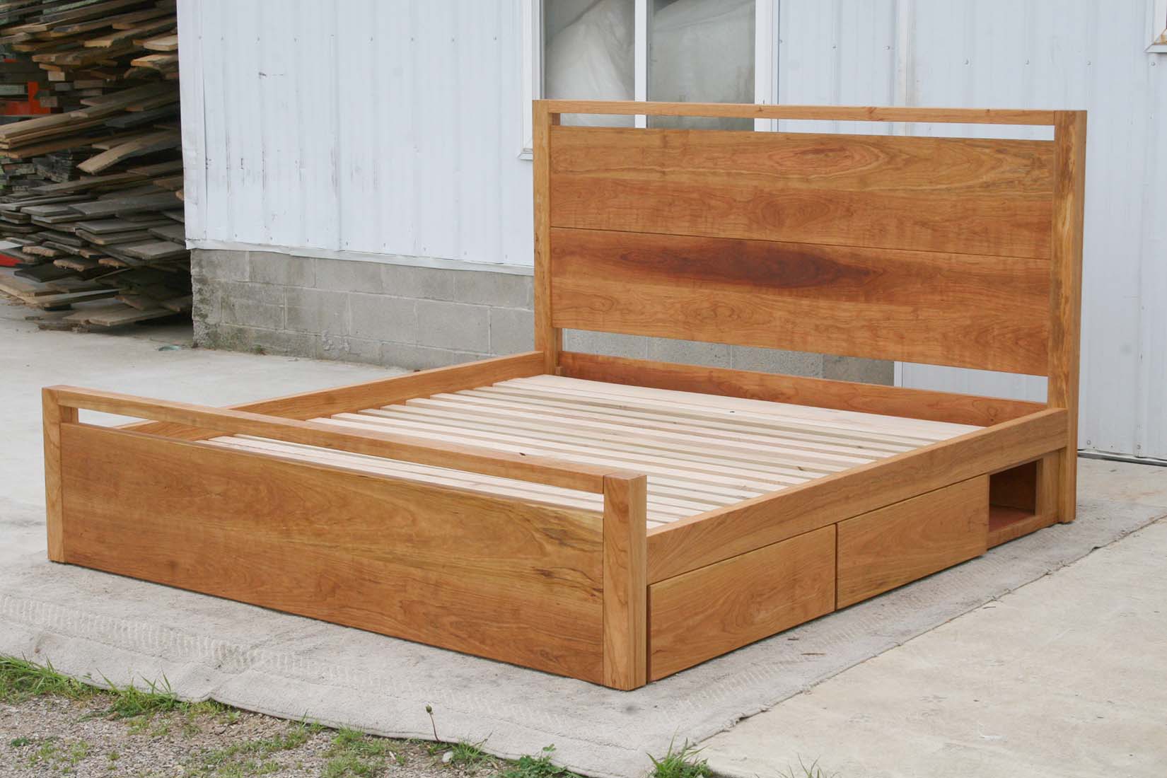 angled view wood Platform Bed with 4 drawers and square posts