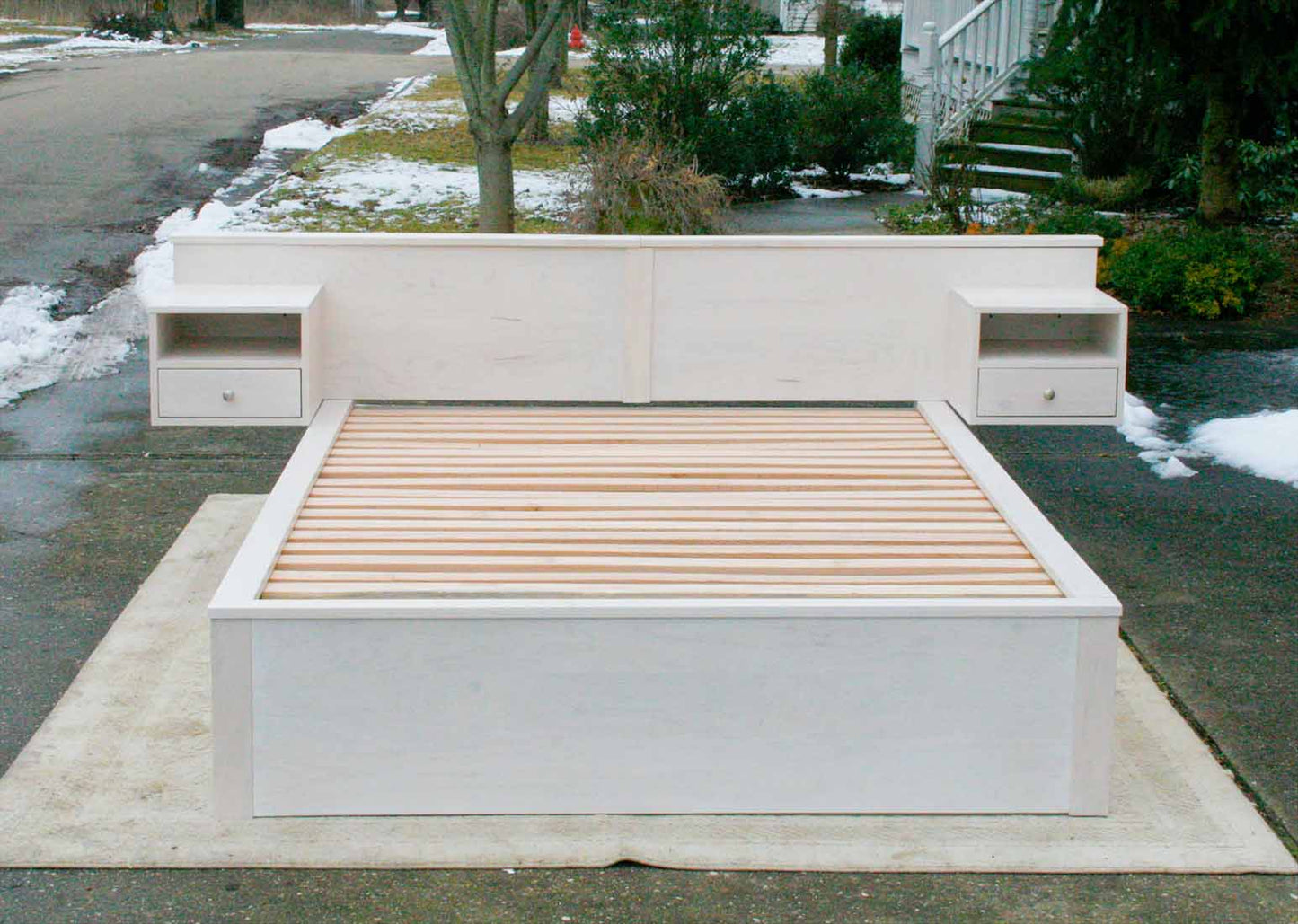 platform bed with 4 drawers wide headboard and built in side tables