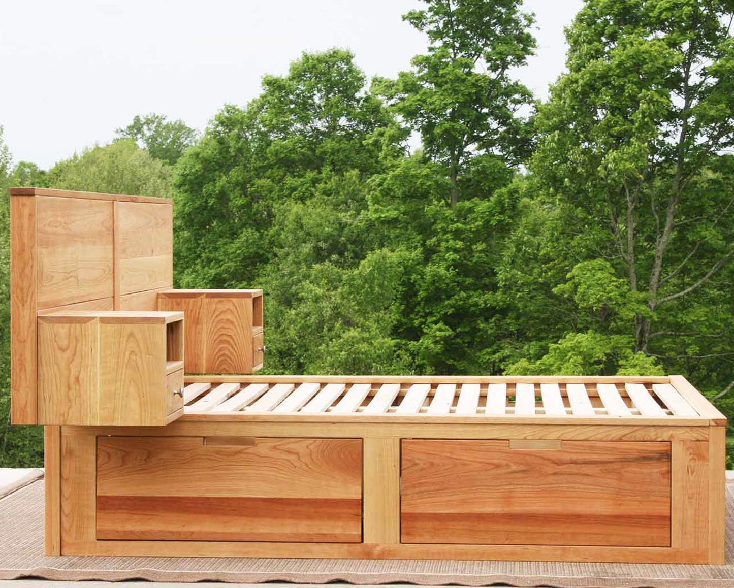 solid Platform Bed with 4 drawers, wide headboard and built-in side tables side view