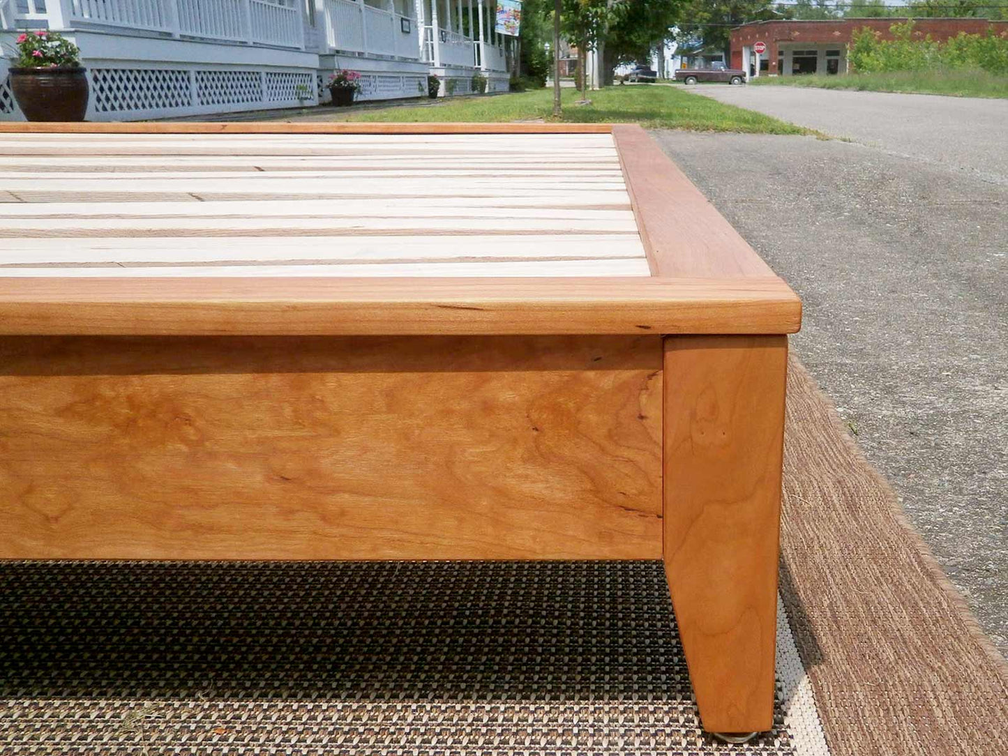Low Platform Bed without headboard closeup on corner