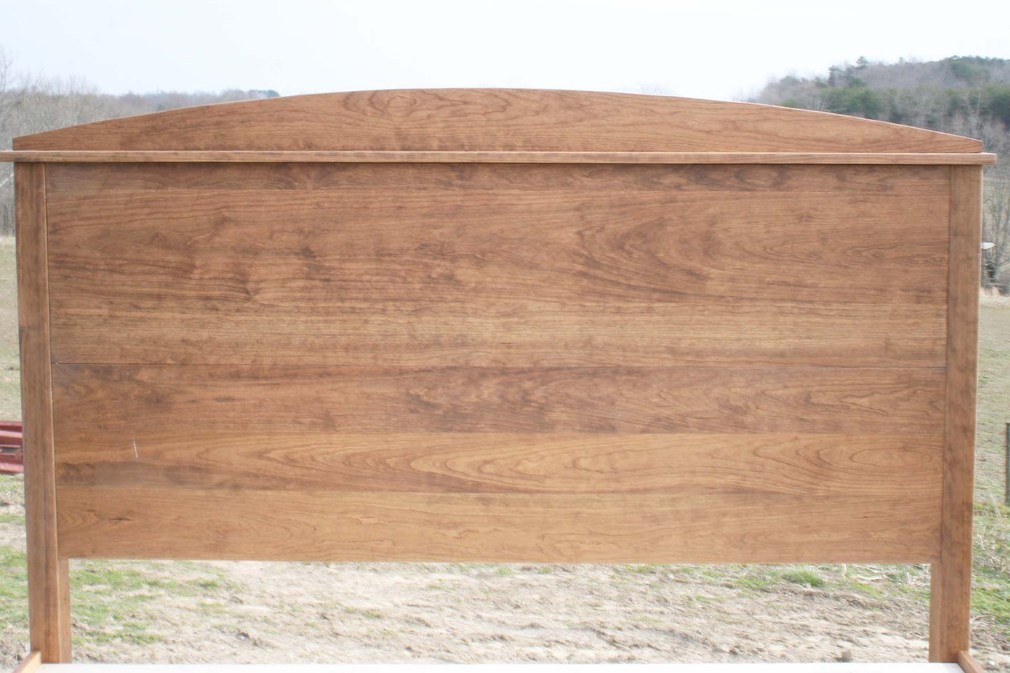 headboard of platform bed with tall arched headboard