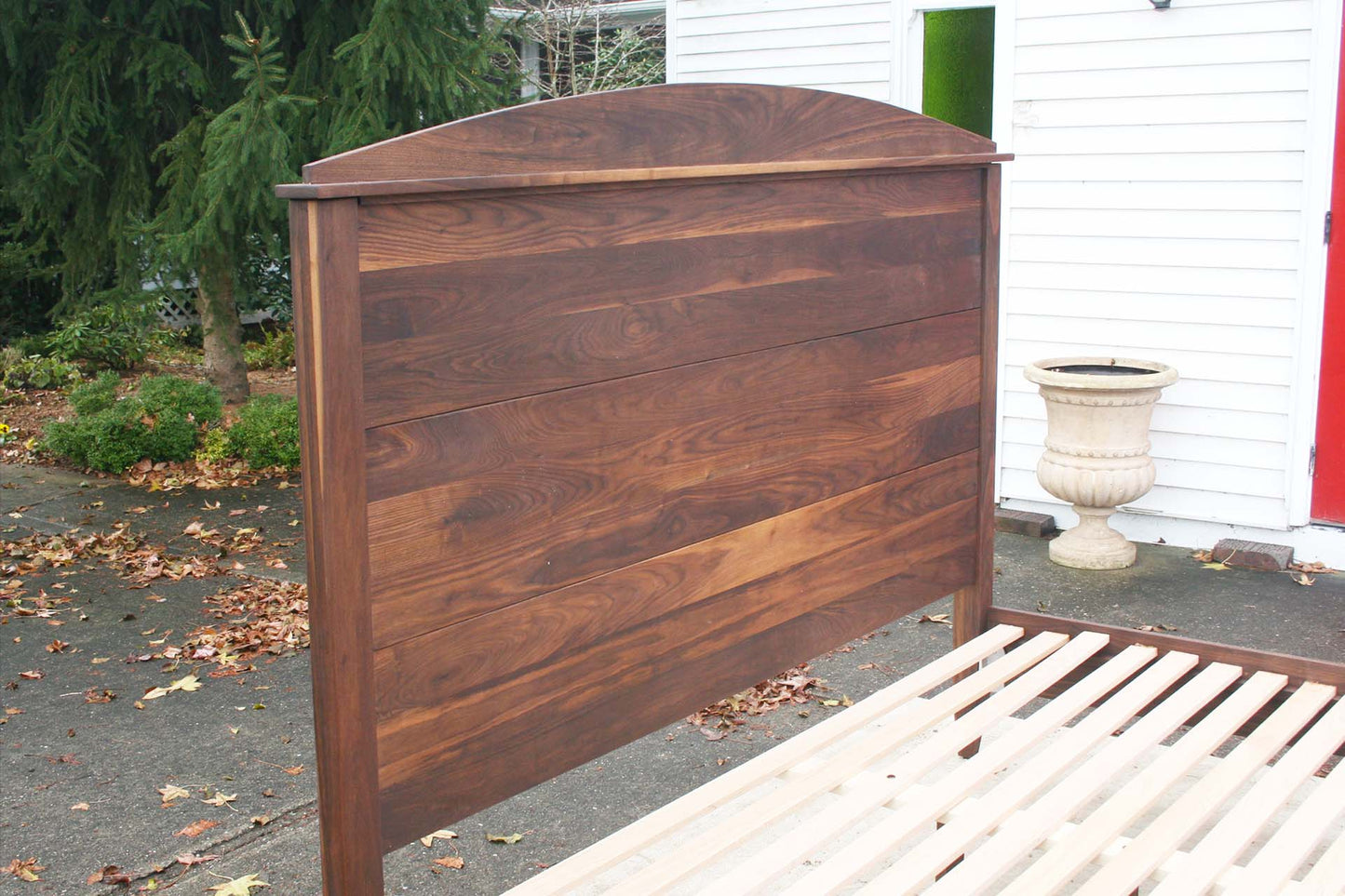 headboard of platform bed with tall arched headboard