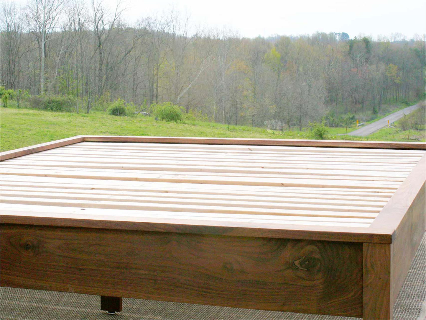 close up Low Platform Bed with tapered corner posts