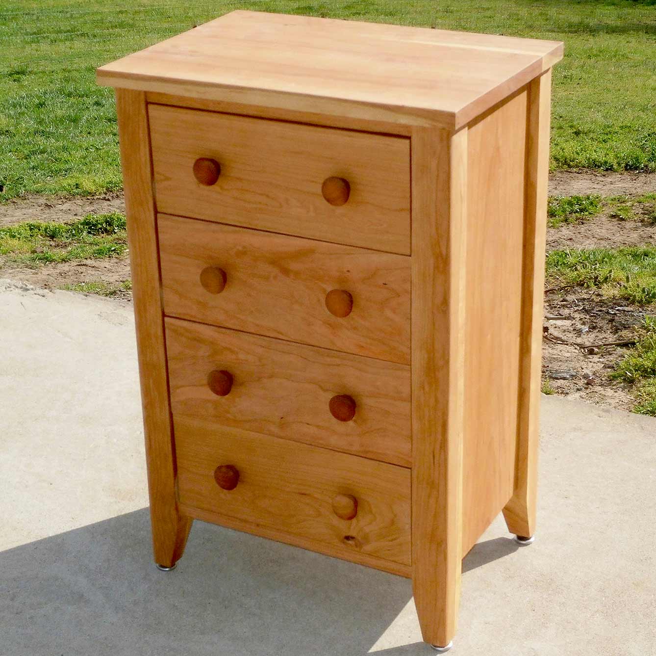 small cabinet with cherry wood pulls