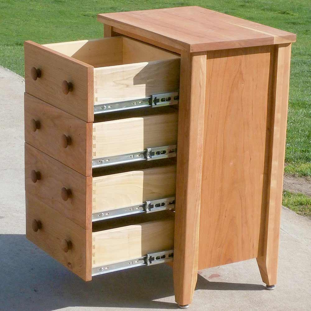 angled view small cabinet with drawers open