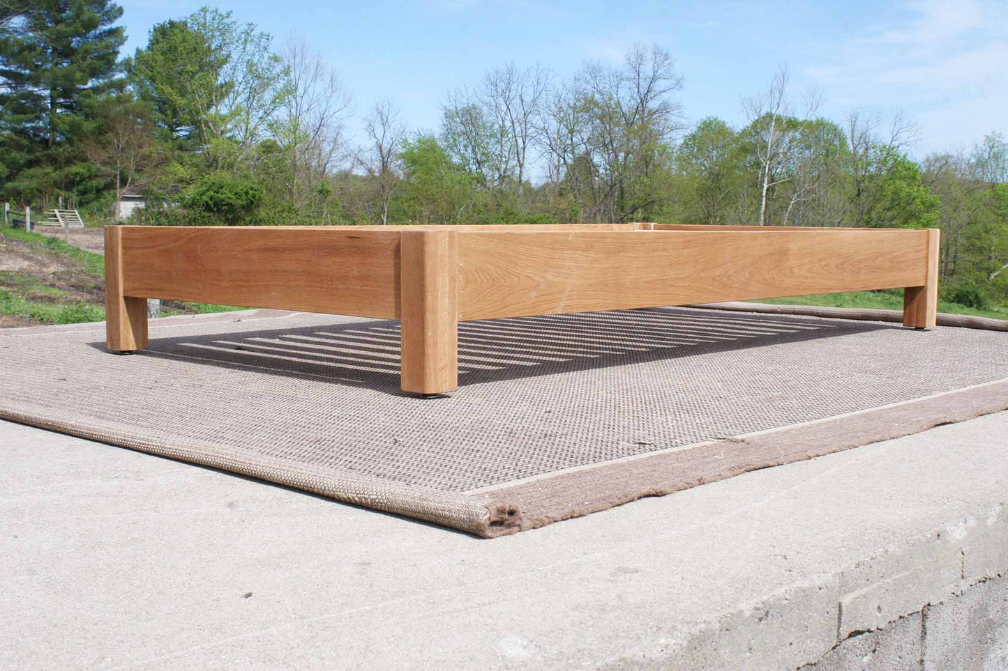 storage bed with 6 drawers and angled headboard low angled view