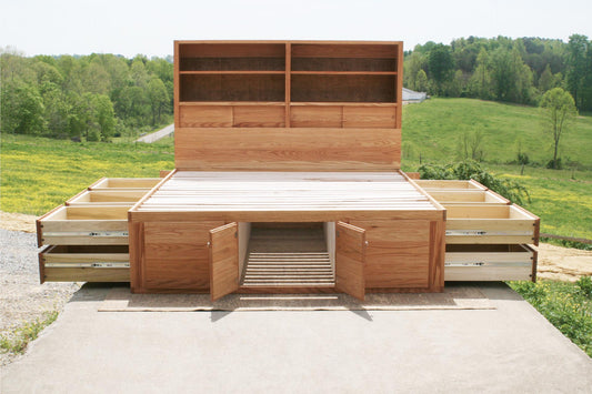 Red Oak captains bed with drawers open