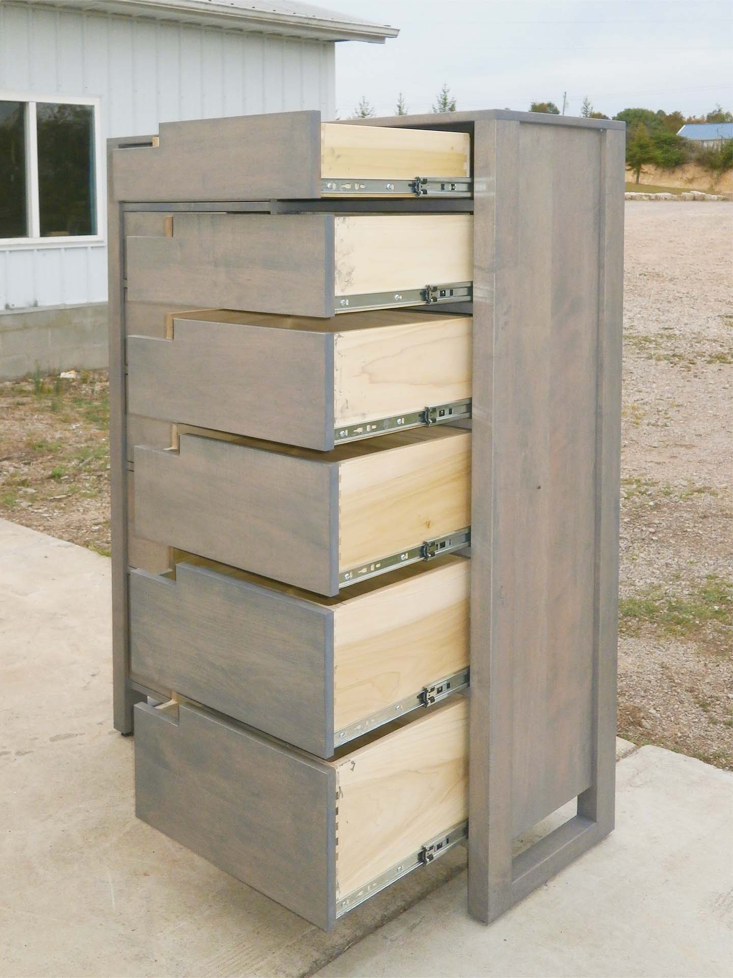 gray 12 drawer dresser with drawers open