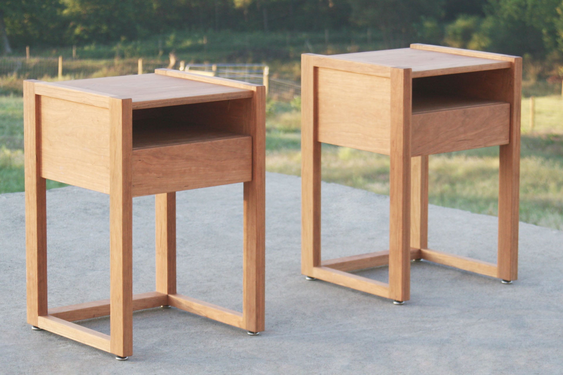 hardwood nightstand with shelves and drawers angled view