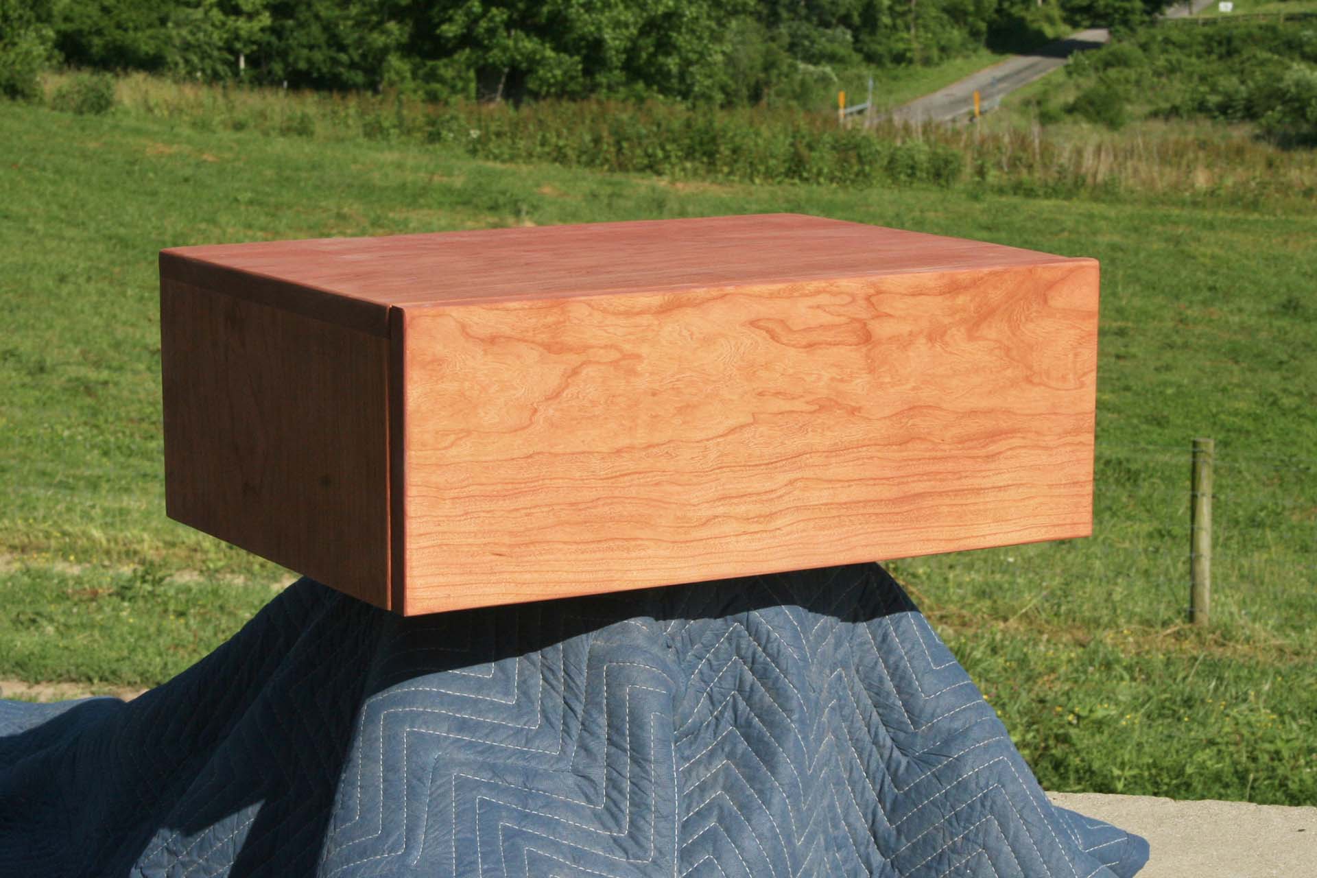 floating nightstand in hardwood
