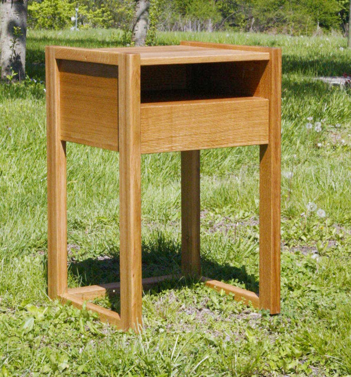 solid wood bedside table angle view