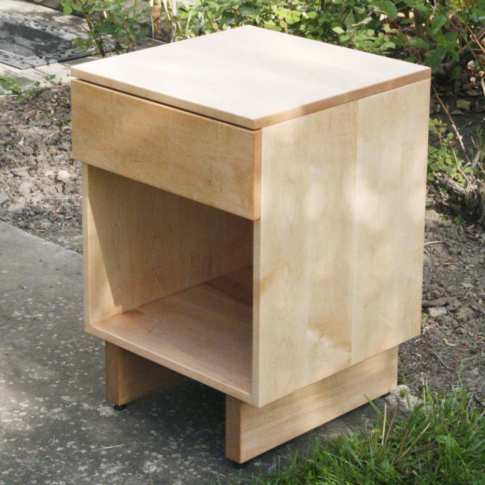 angled view natural one drawer nightstand
