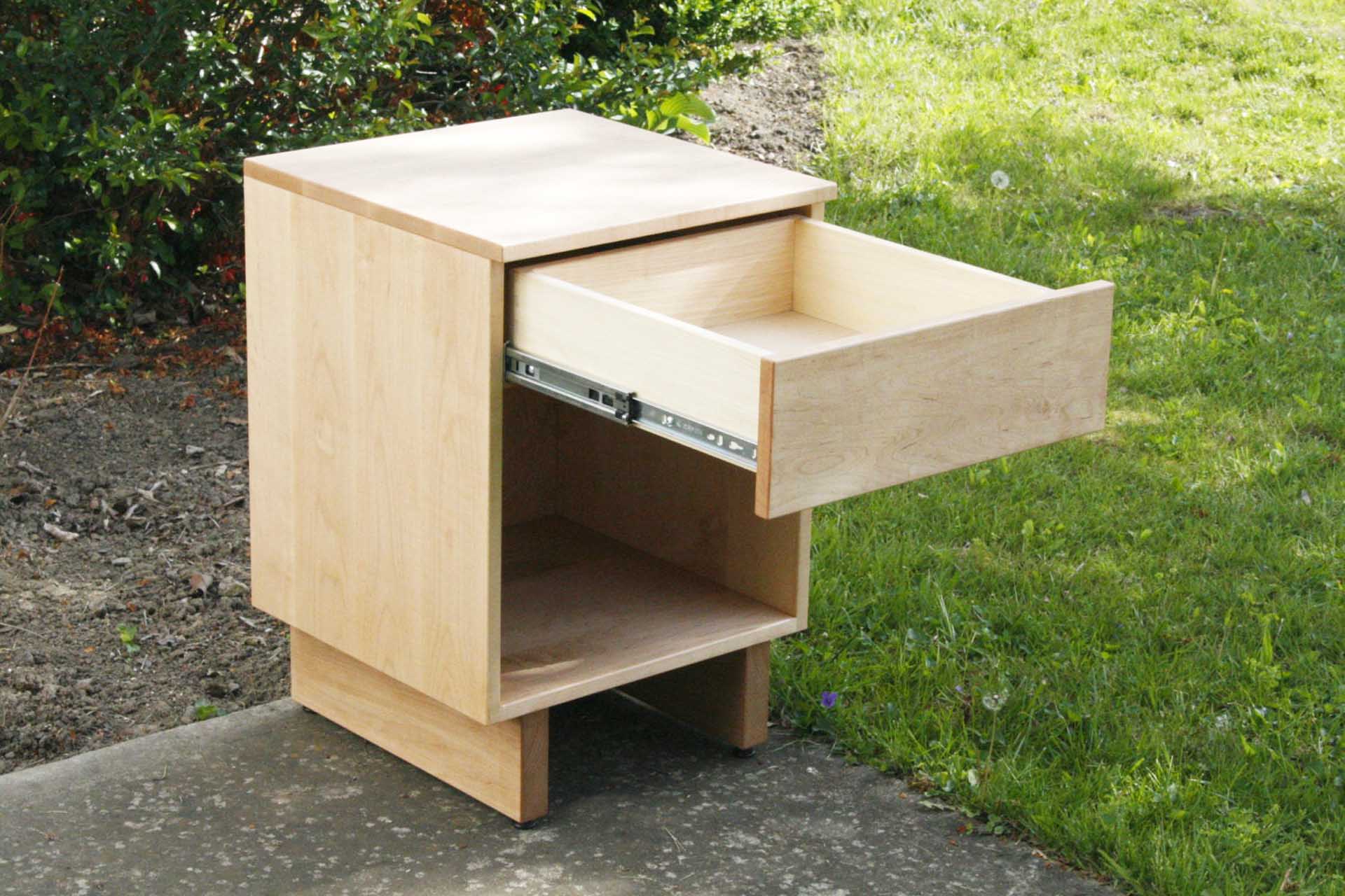 angled view drawer open one drawer nightstand