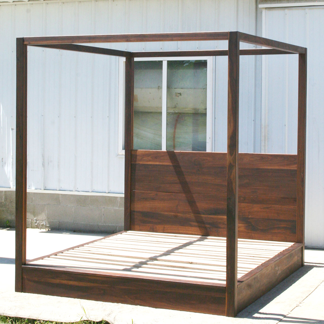 natural wood Low Canopy Bed with low platform and large rails