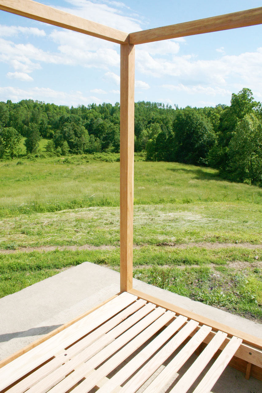 green field and Low Canopy Bed with low platform and large rails