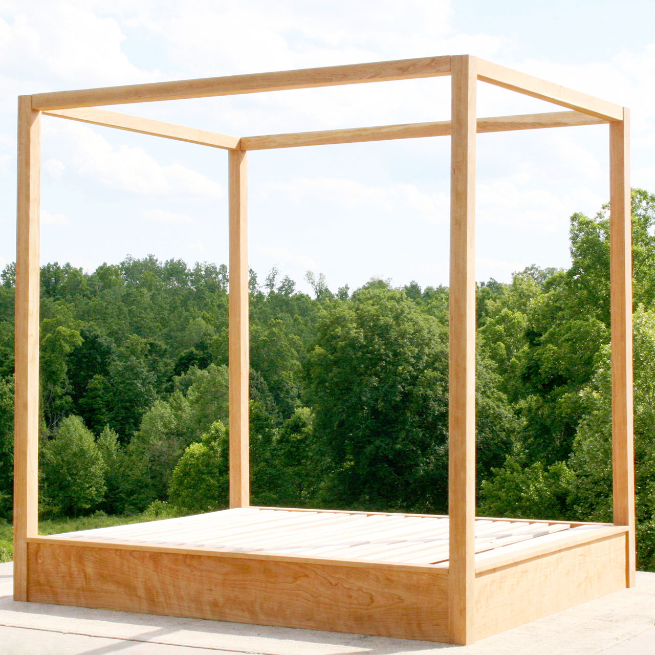 side angled view Low Canopy Bed with low platform and large rails