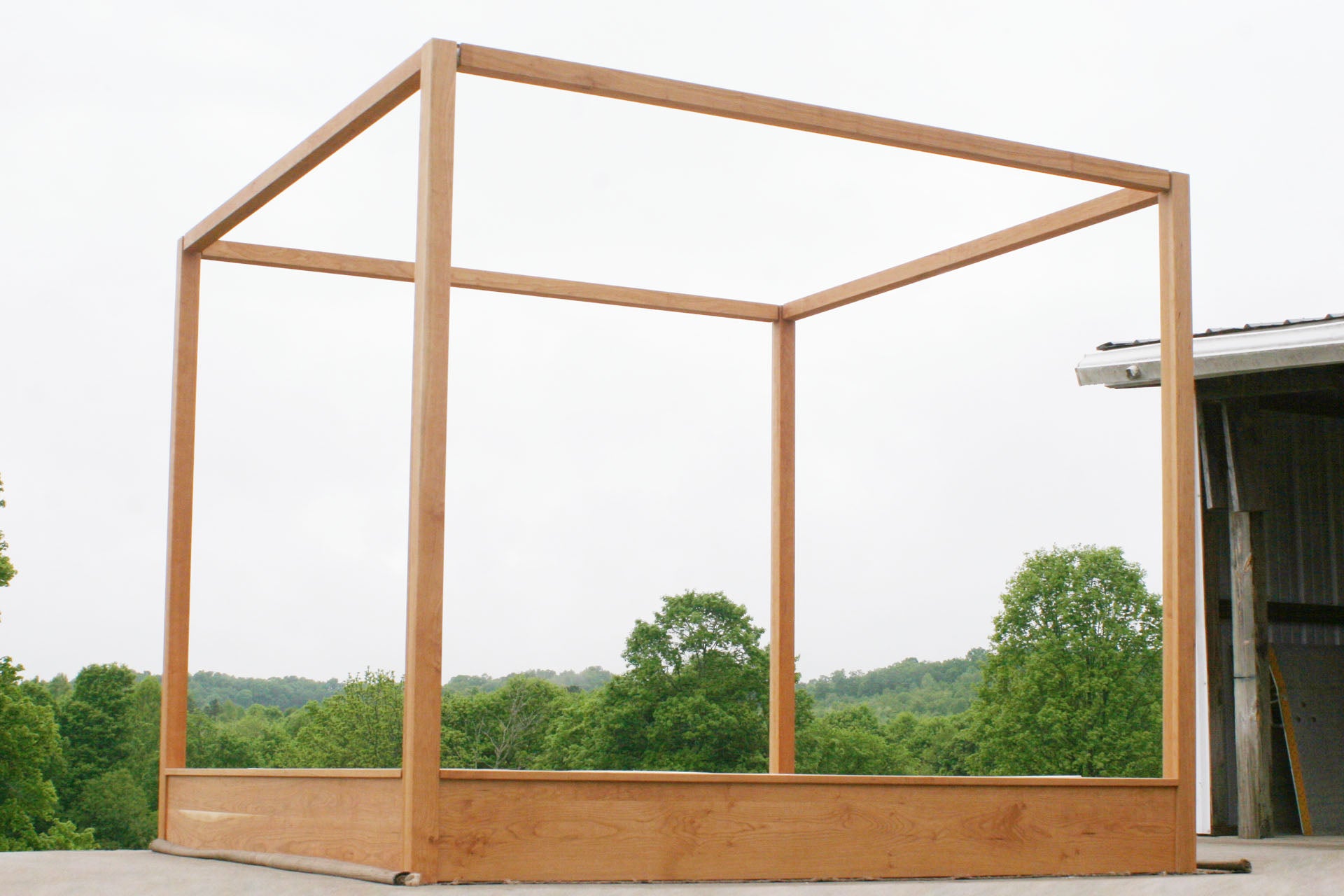 wood Modern canopy bed with wide platform and large rails