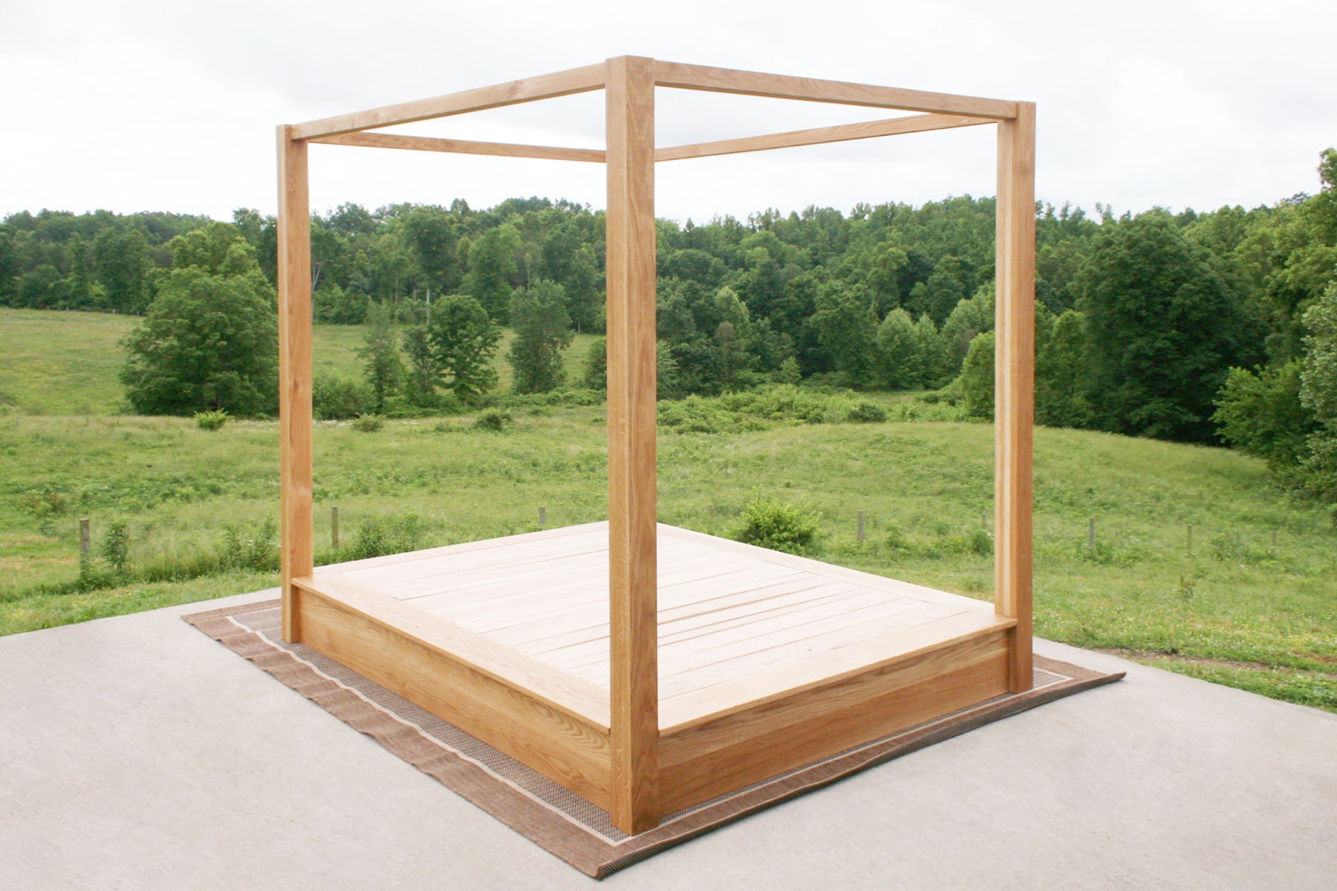 natural Low Platform Bed with large posts and canopy