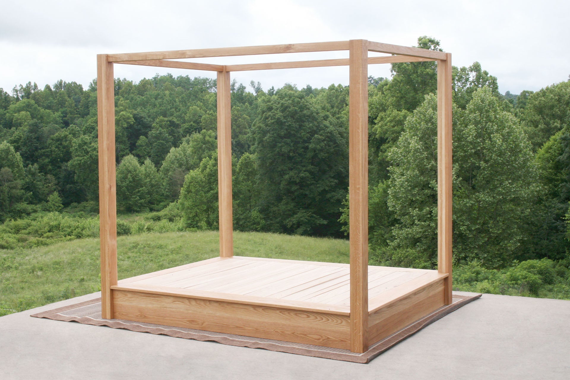 wood Low Platform Bed with large posts and canopy