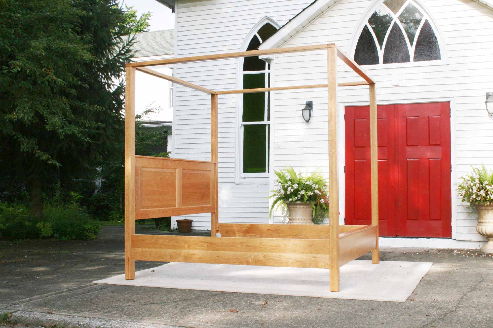 canopy bed with straight posts and paneled headboard wood natural hardwood