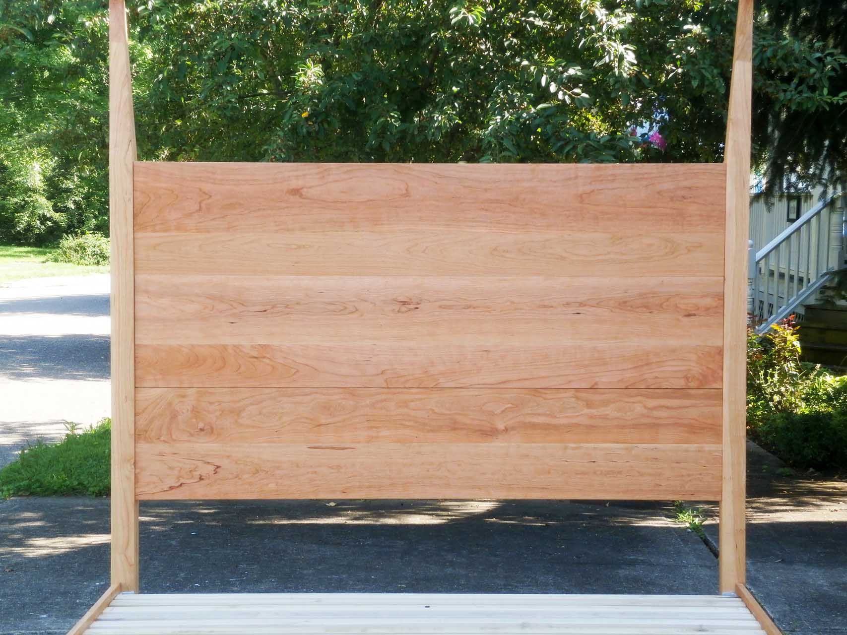headboard of Canopy Bed with a low platform