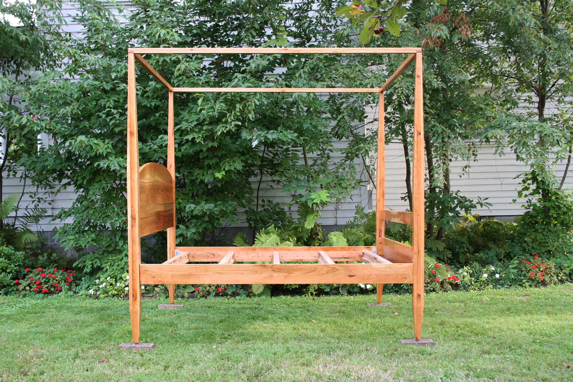 side view canopy bed with tall legs