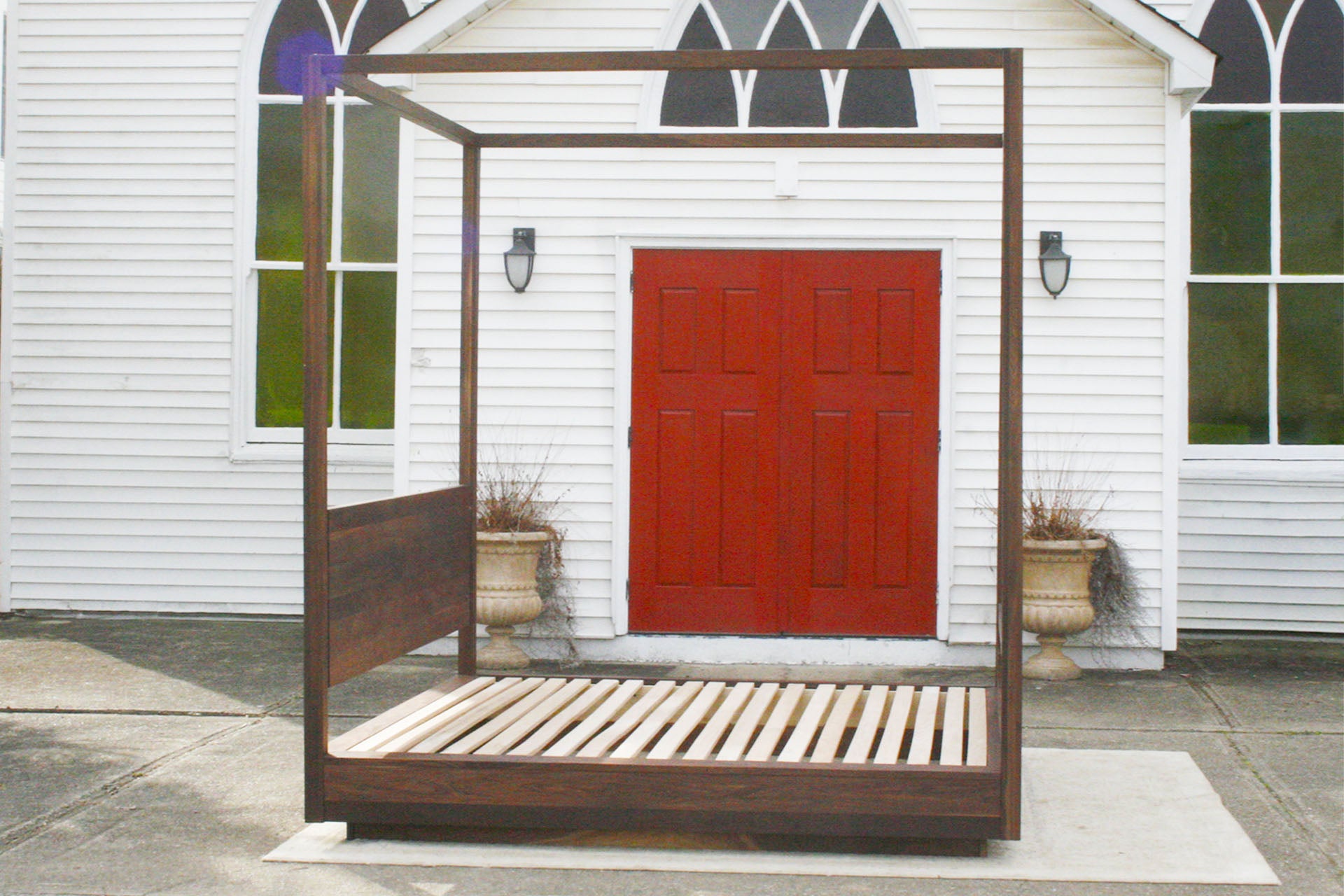 side view Full canopy Bed with large rail and suspended headboard