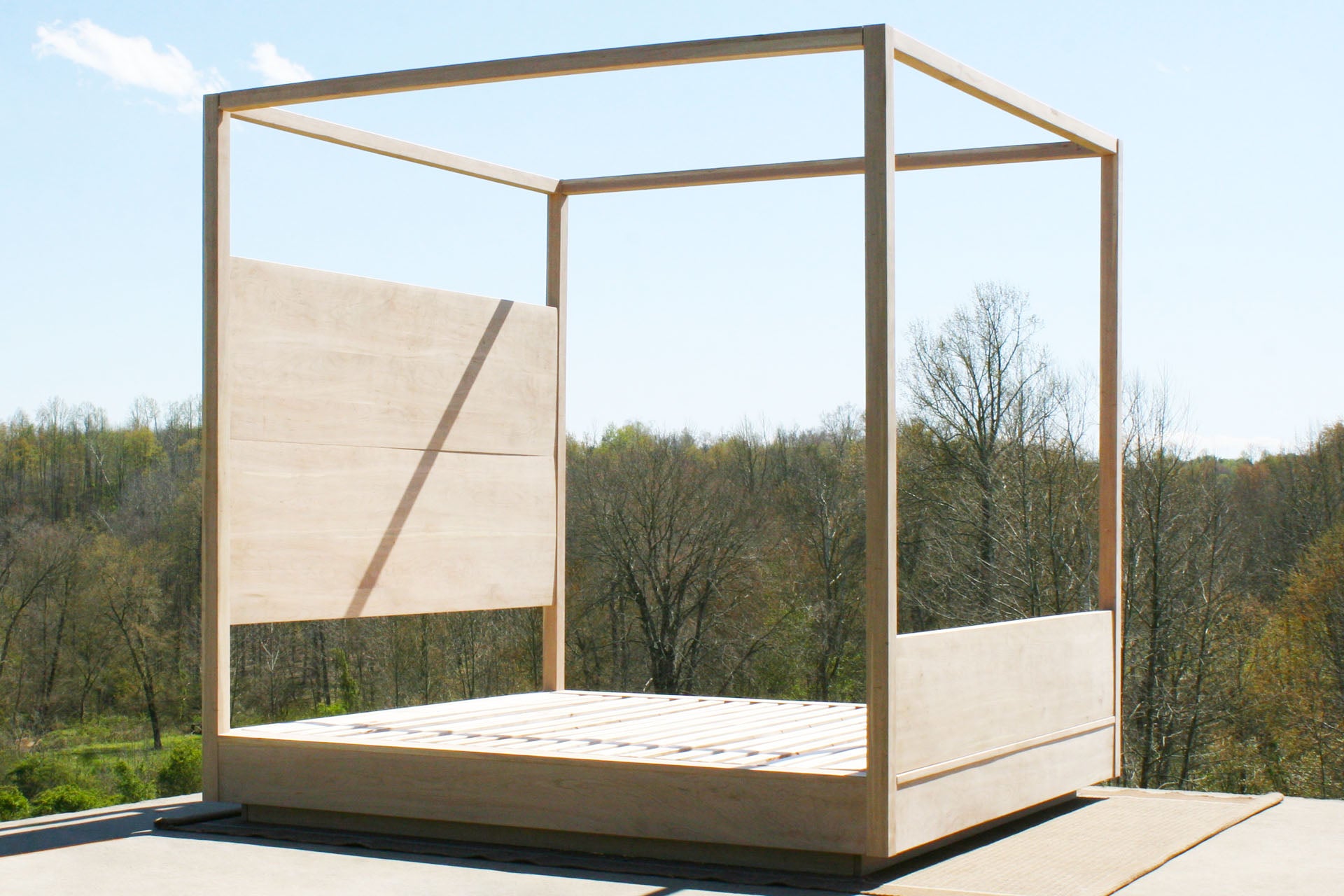 solid canopy Bed with large rail and suspended headboard
