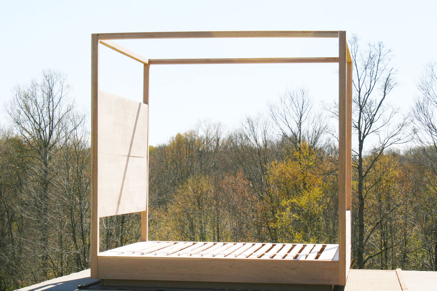 full canopy bed with large rail side view