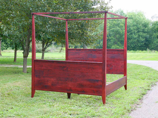 canopy bed with tall headboard and footboard front view