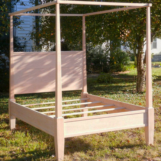canopy bed with tapered posts front angled view