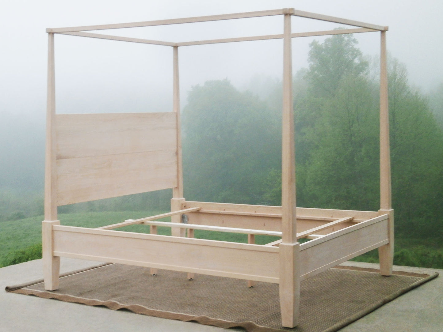 side angled view of solid natural hardwood Canopy Bed with straight posts and side rails