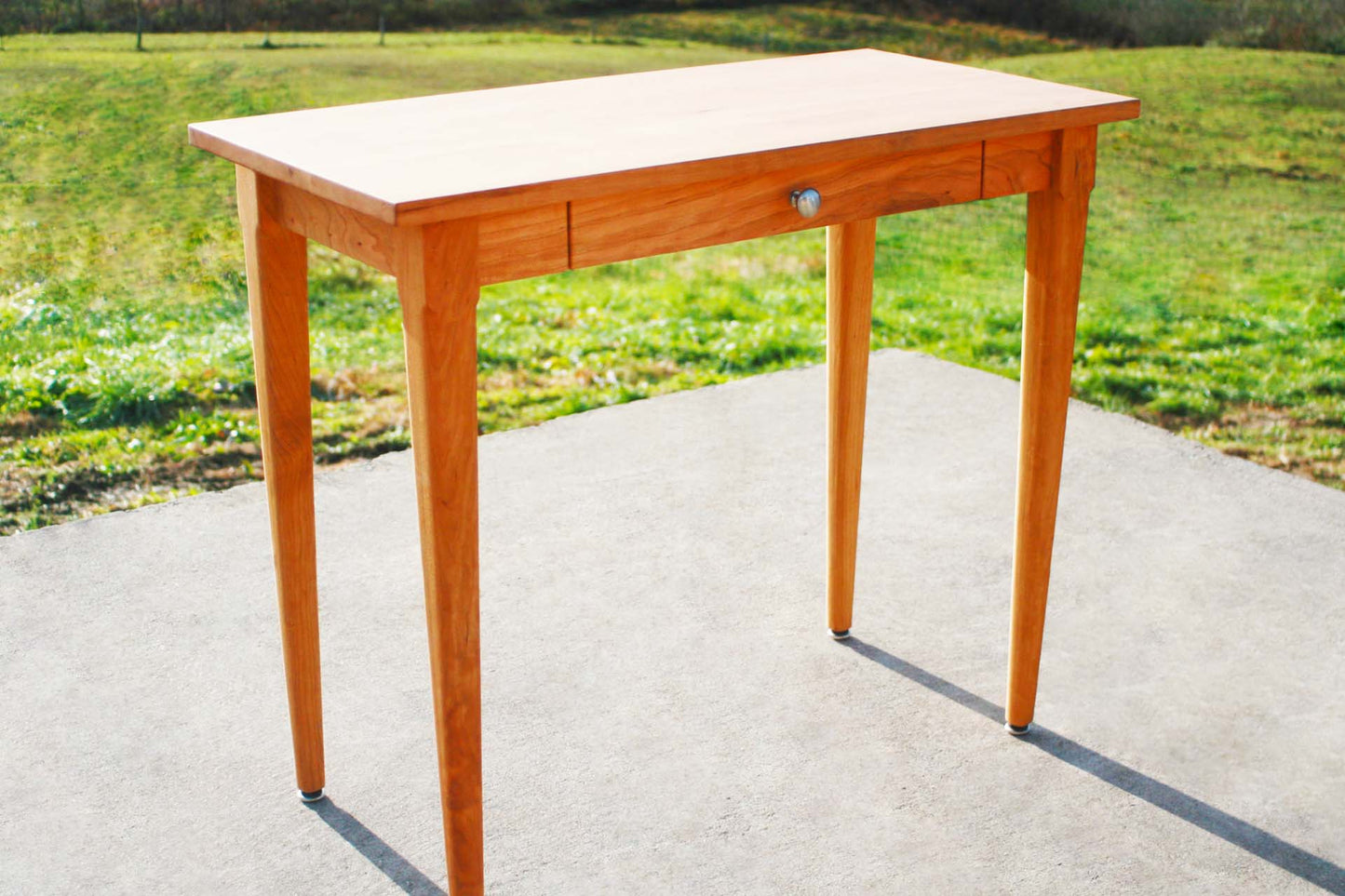 angled view natural Vanity desk with one drawer