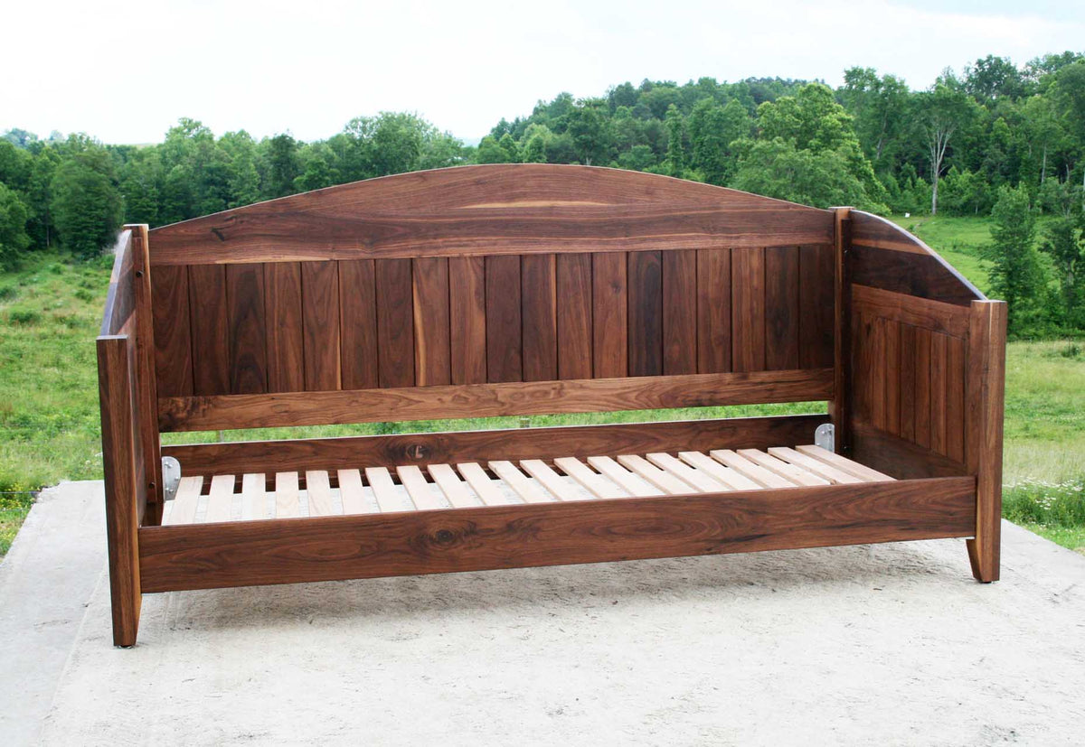 Day bed with arched back and sides