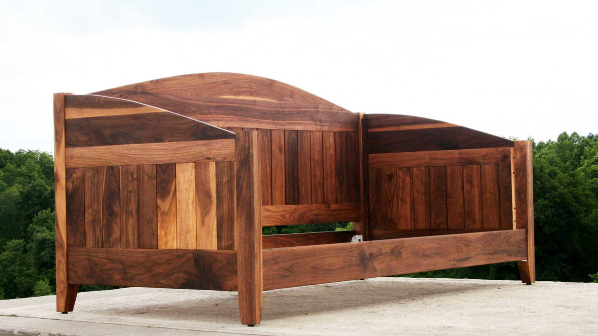 side angled view Day bed with arched back and sides