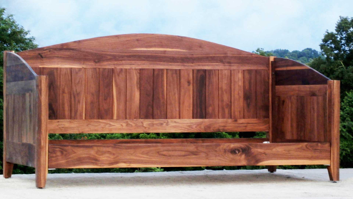 front angled view hardwood Day bed with arched back and sides
